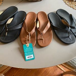 Three pair of leather Olukai flip flops. Ladies 7.